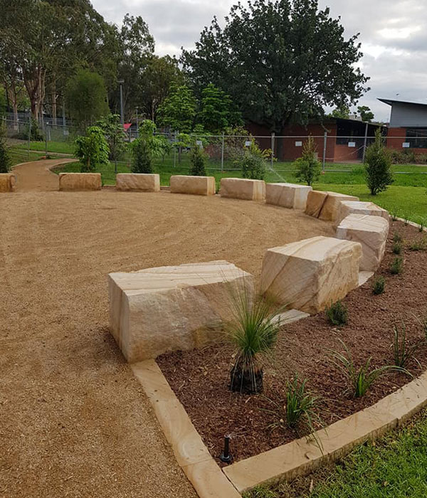 Thomas Reddall High School commercial landscape design and construction campbelltown nsw yarning circle, sandstone blocks